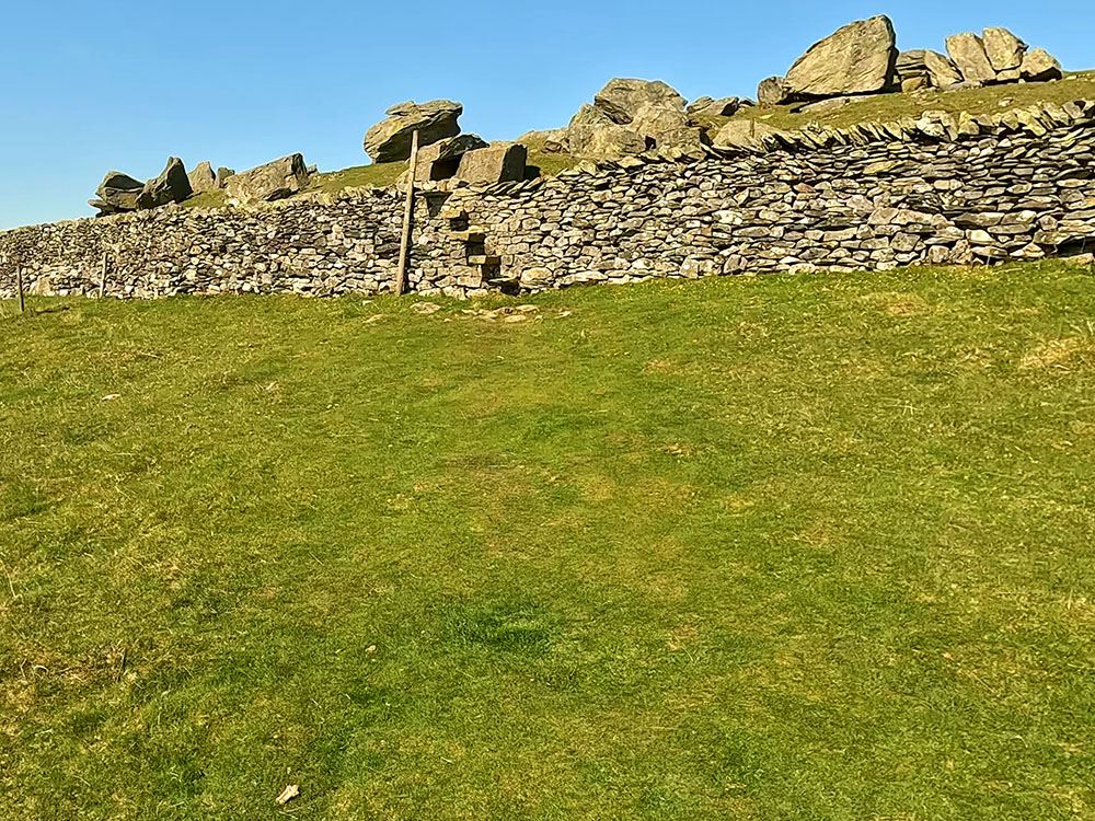Wall stile in front of the Erratics