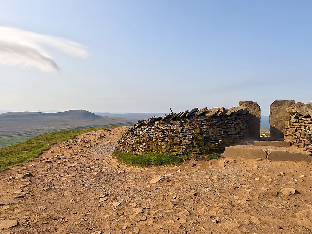 Gap through the wall on Whernside summit to reach the trig point