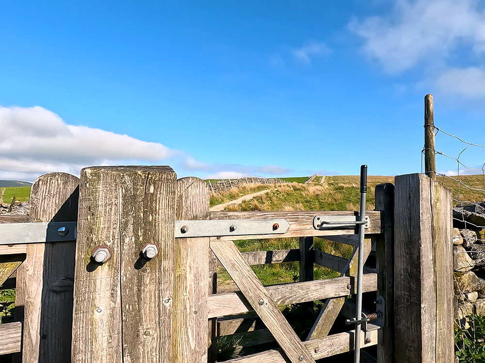 Gate stile through which the 3 Peaks path passes to leave the Pennine Way to head towards High Birkwith