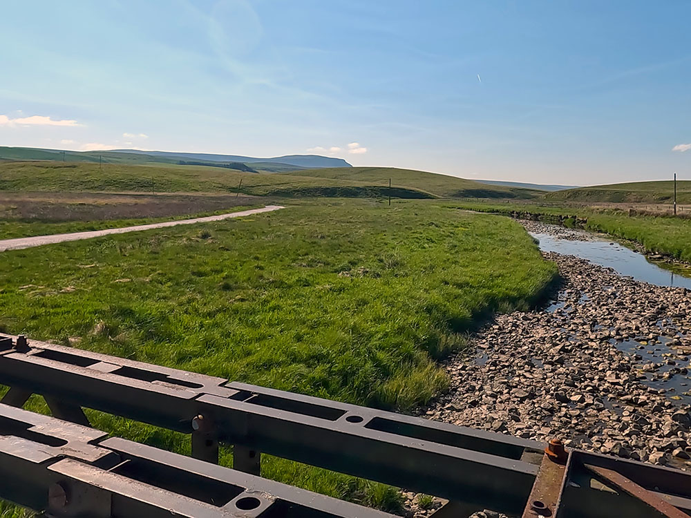 Looking back towards Pen-y-ghent from the footbridge