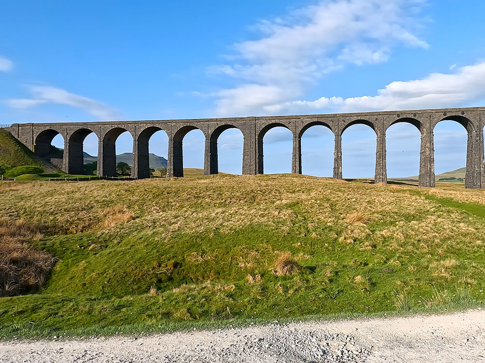 Looking towards Ingleborough through the arches of the Ribblehead Viaduct