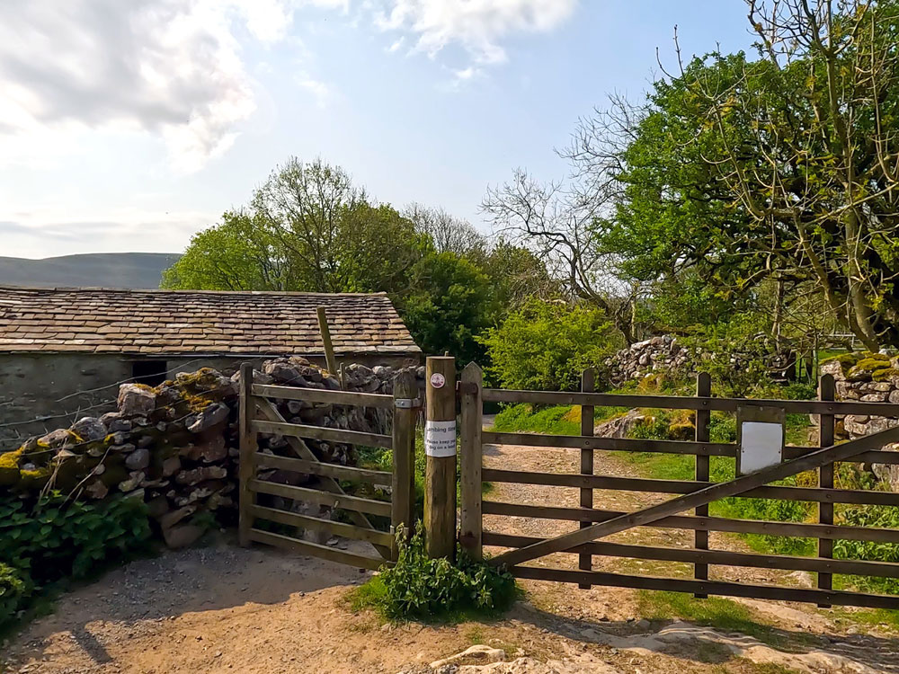 Pass through the gate before turning right towards Bruntscar