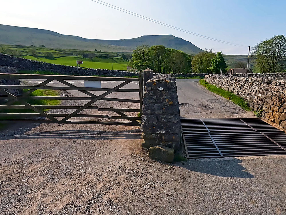 Turn left on reaching Low Sleights Road with Ingleborough ahead on the horizon