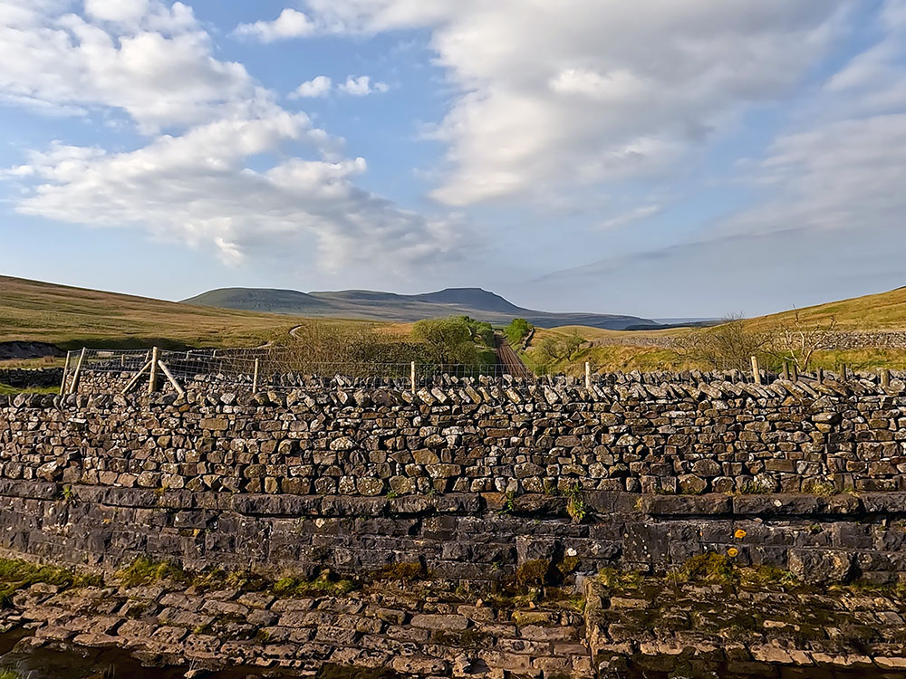 View over the aqueduct along the Settle to Carlisle railway line in the direction of Ingleborough