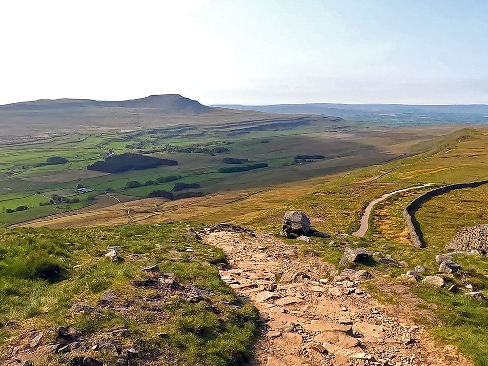 Where the path starts to drop more steeply on the descent from Whernside summit