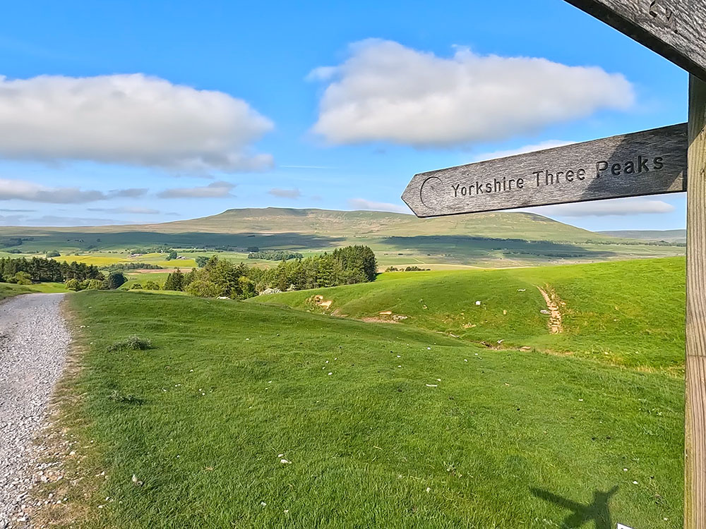 Yorkshire Three Peaks signpost pointing towards Ingleborough