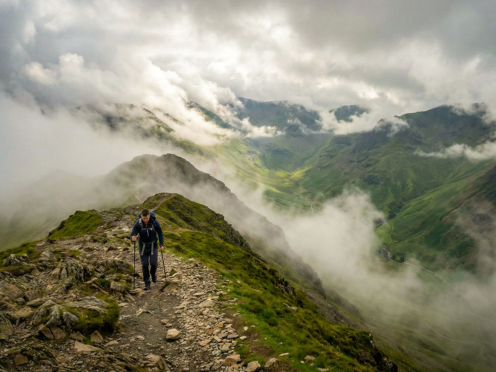 Cinematic photo of a single hiker ascending a rocky ridge in the UK Lake District